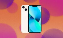 Two iPhone 13s appear on a purple and orange background with abstract bubbles.